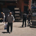Daily life in Alexandria's bustling street market, capturing local culture and interactions.